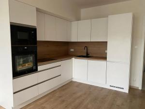 Prodej bytu 1+kk, Praha - Dolní Měcholupy, Kardausova, 31 m2