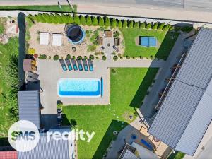 Prodej apartmánu, Milovice, 255 m2