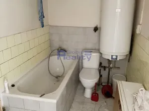 Prodej podílu pozemku pro bydlení, Pouzdřany, Hlavní, 902 m2